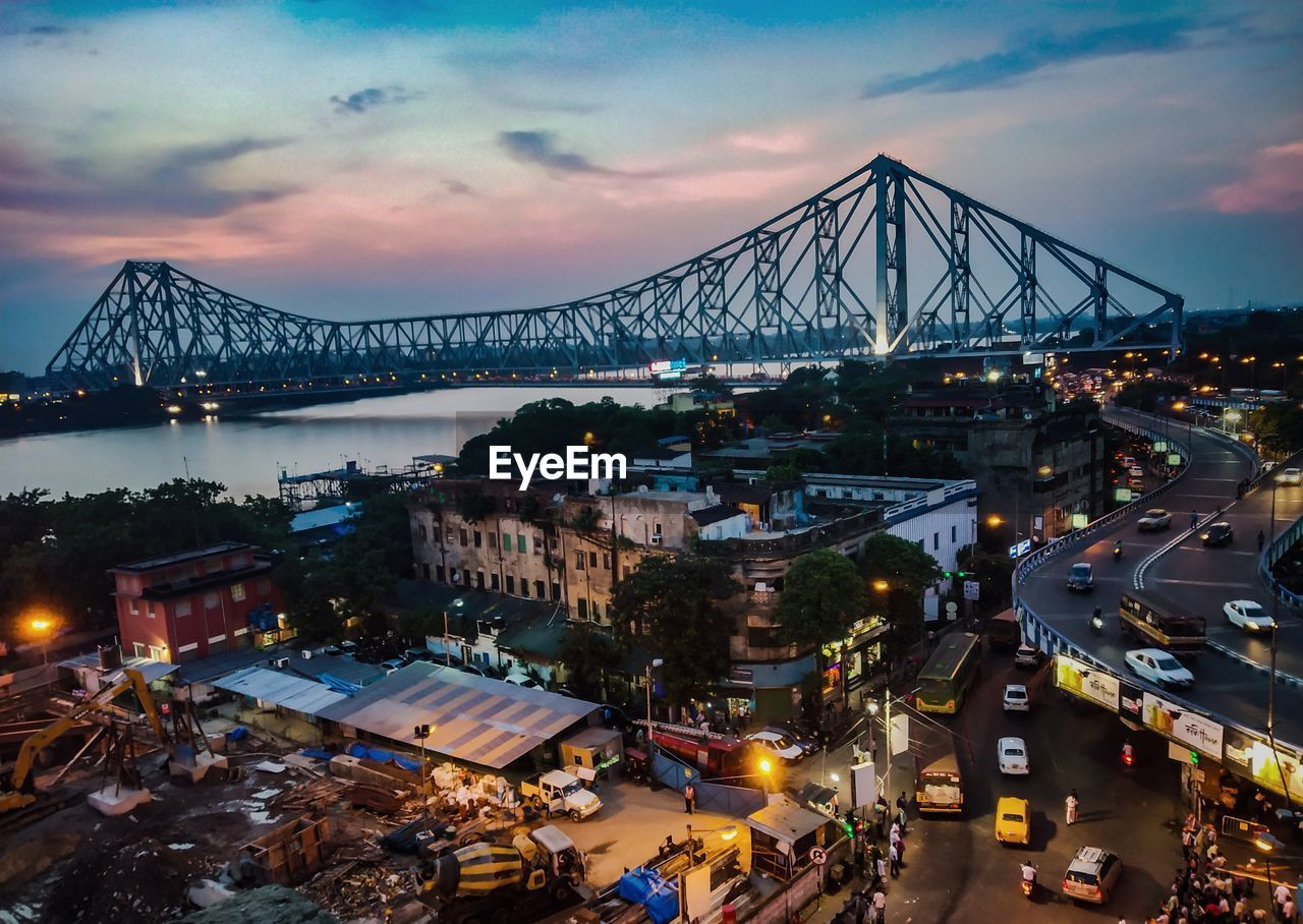 High angle view of illuminated city against sky