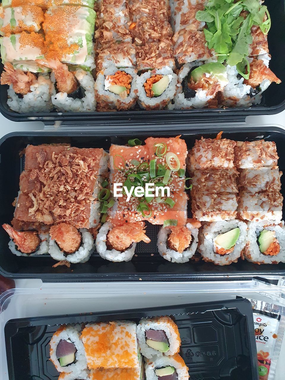 food, food and drink, freshness, meal, seafood, healthy eating, japanese cuisine, dish, ekiben, lunch, cuisine, japanese food, high angle view, no people, bento, wellbeing, asian food, still life, meat, directly above, sushi, indoors, rice, tray, variation, serving size, fish, plate, vegetable, table, culture, california roll