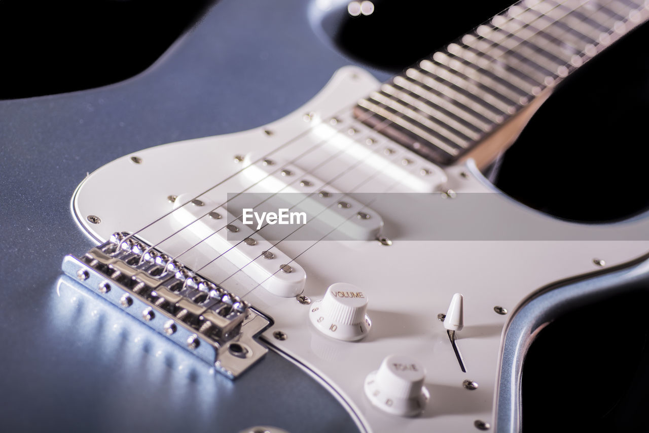 Cut tight macro of a electric guitar