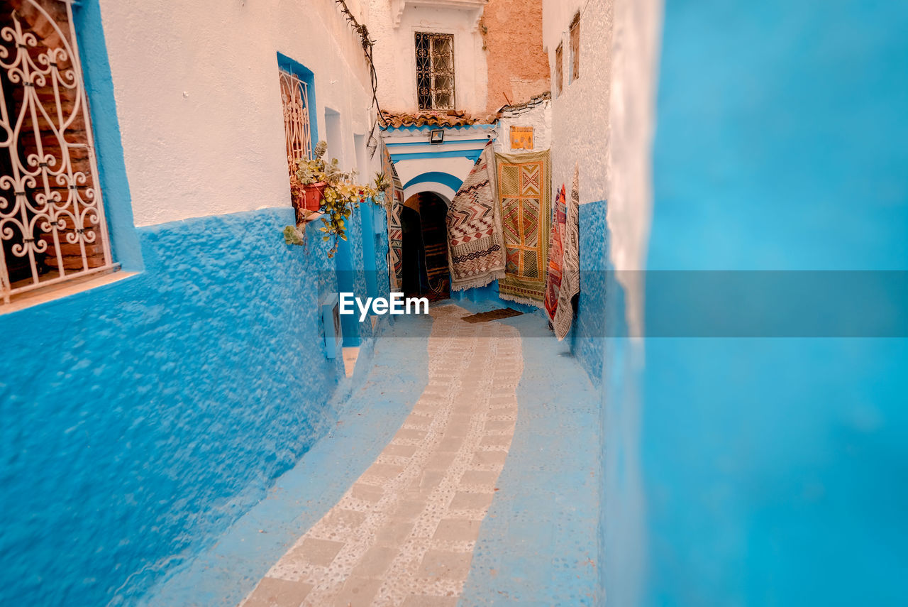 Narrow alley amidst buildings