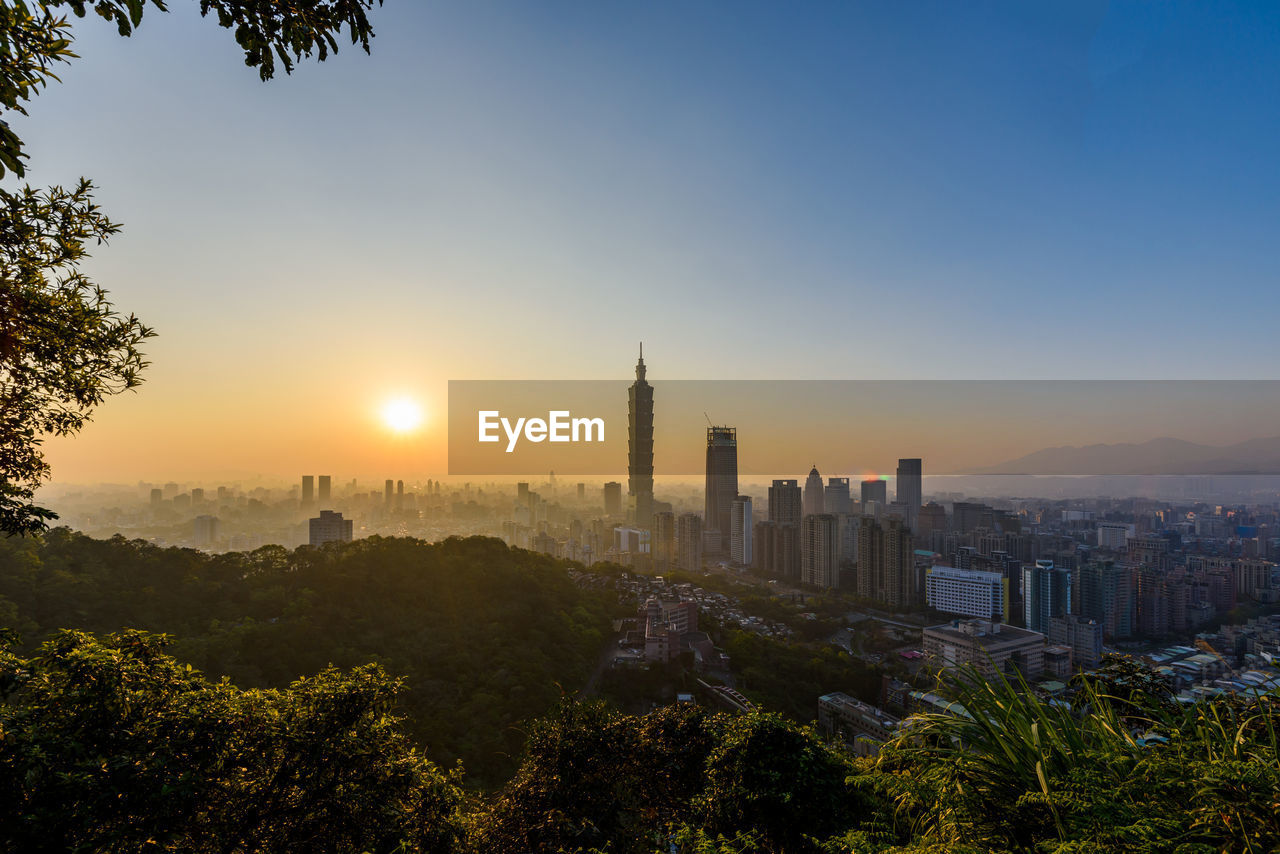 View of buildings against sky during sunset