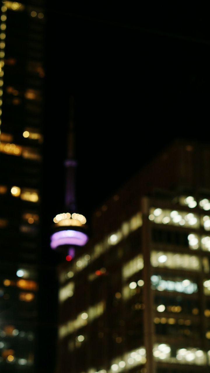 VIEW OF ILLUMINATED STREET LIGHTS AT NIGHT