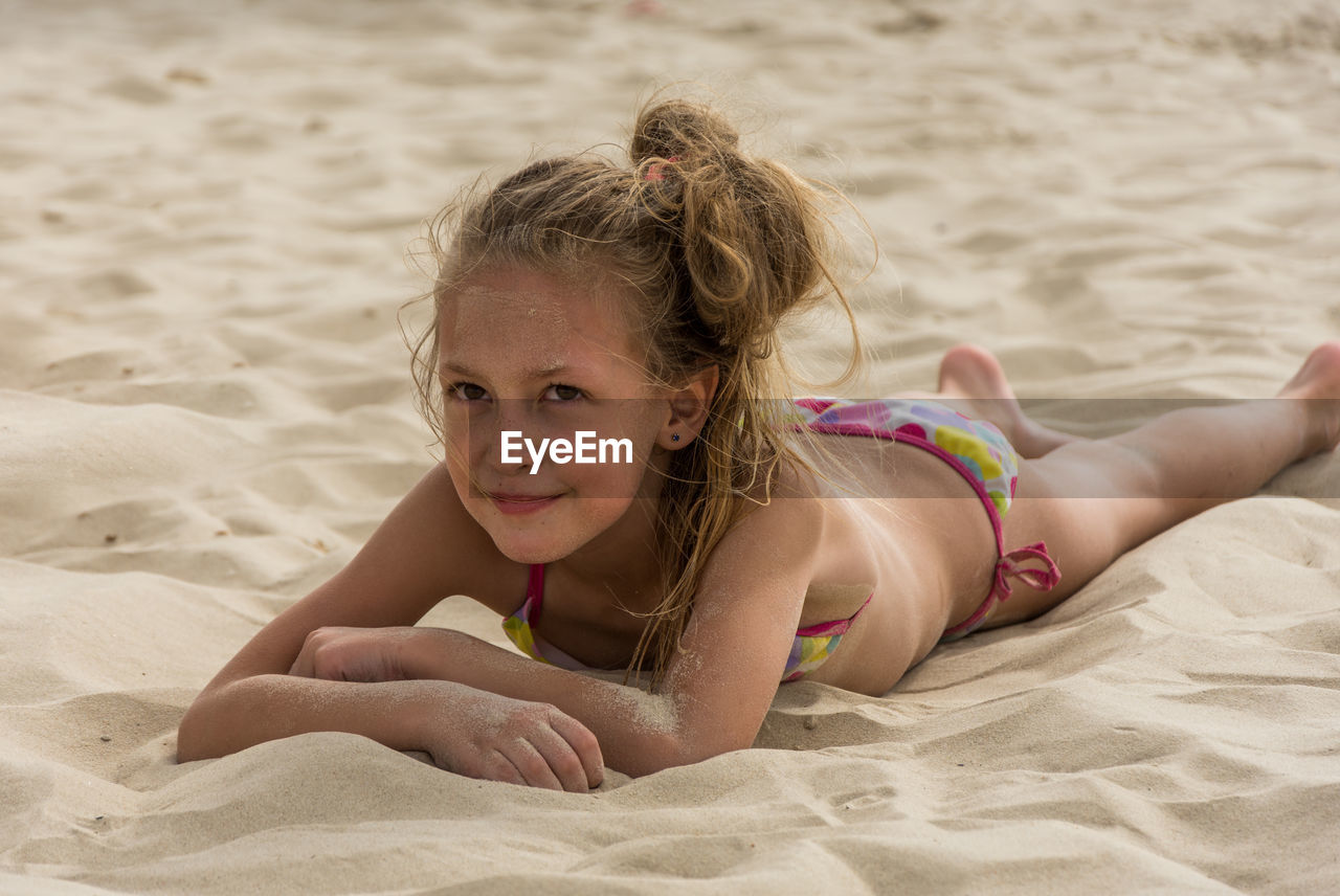 Child on sand at beach