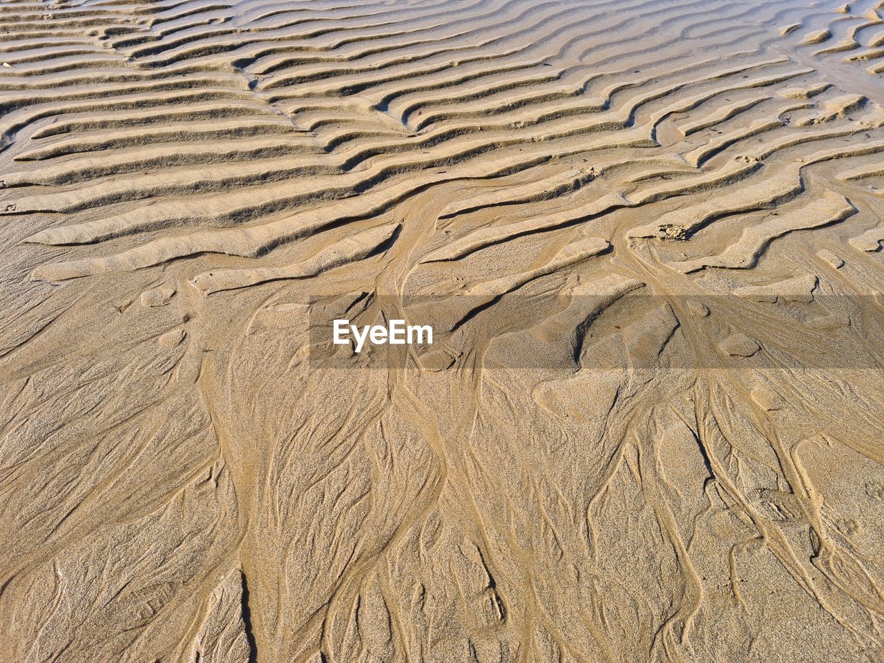 High angle view of sand on beach