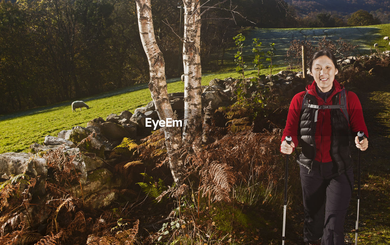 Mature female hiker on walking path in north wales