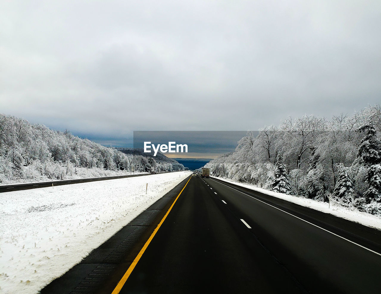 Road against sky during winter