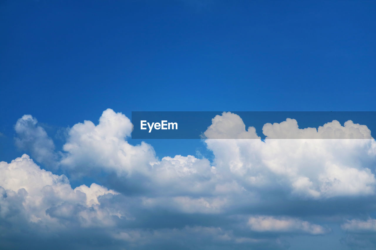 Low angle view of clouds in blue sky