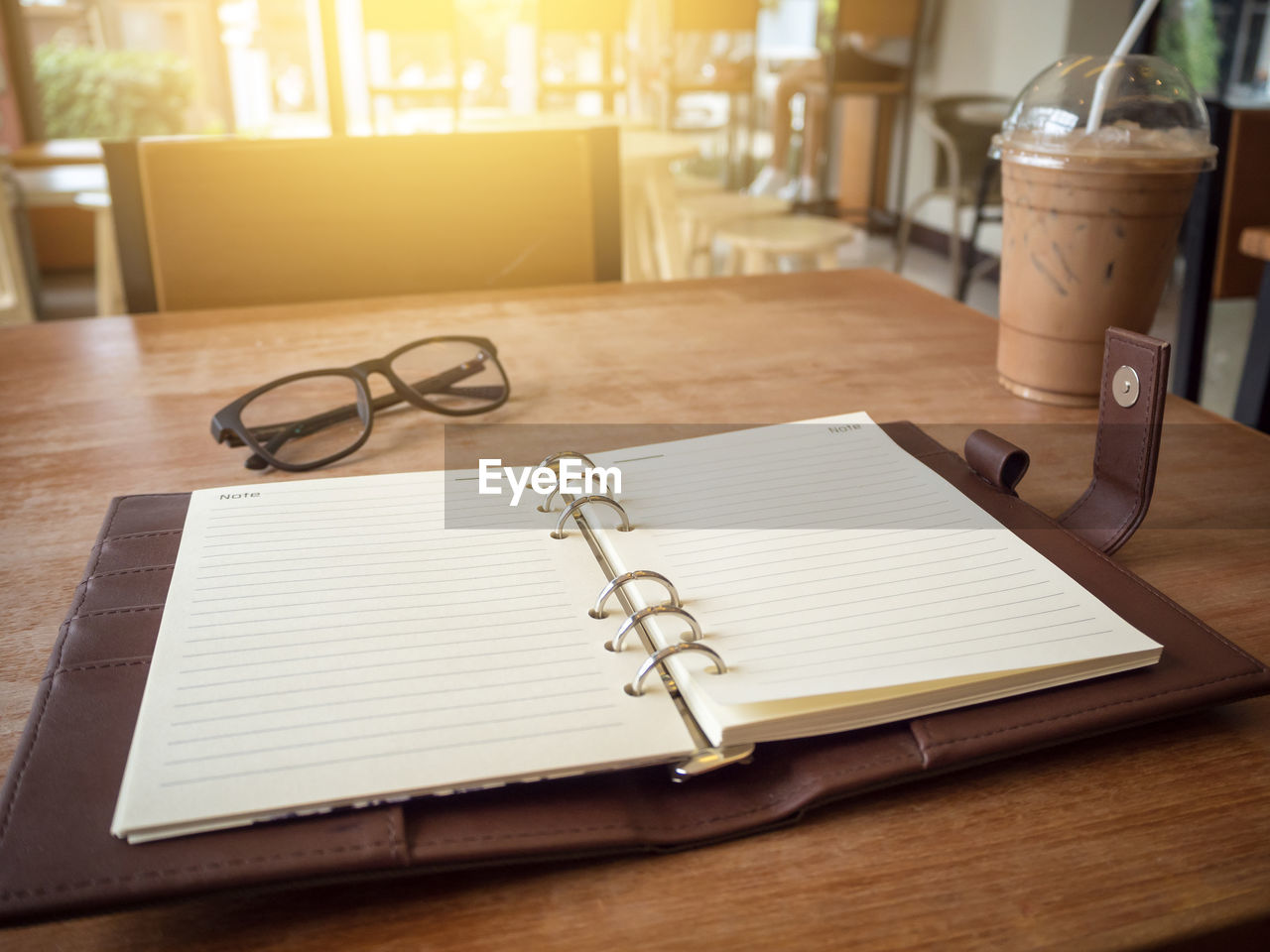 OPEN BOOK ON TABLE IN OFFICE