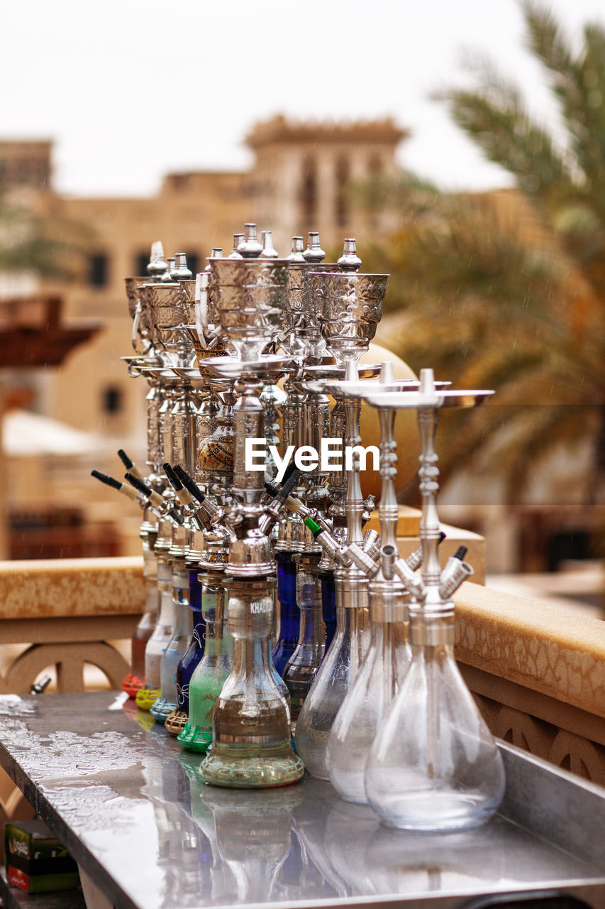 Group of oriental hookahs in a restaurant under the fresh air. hookah smoking concept