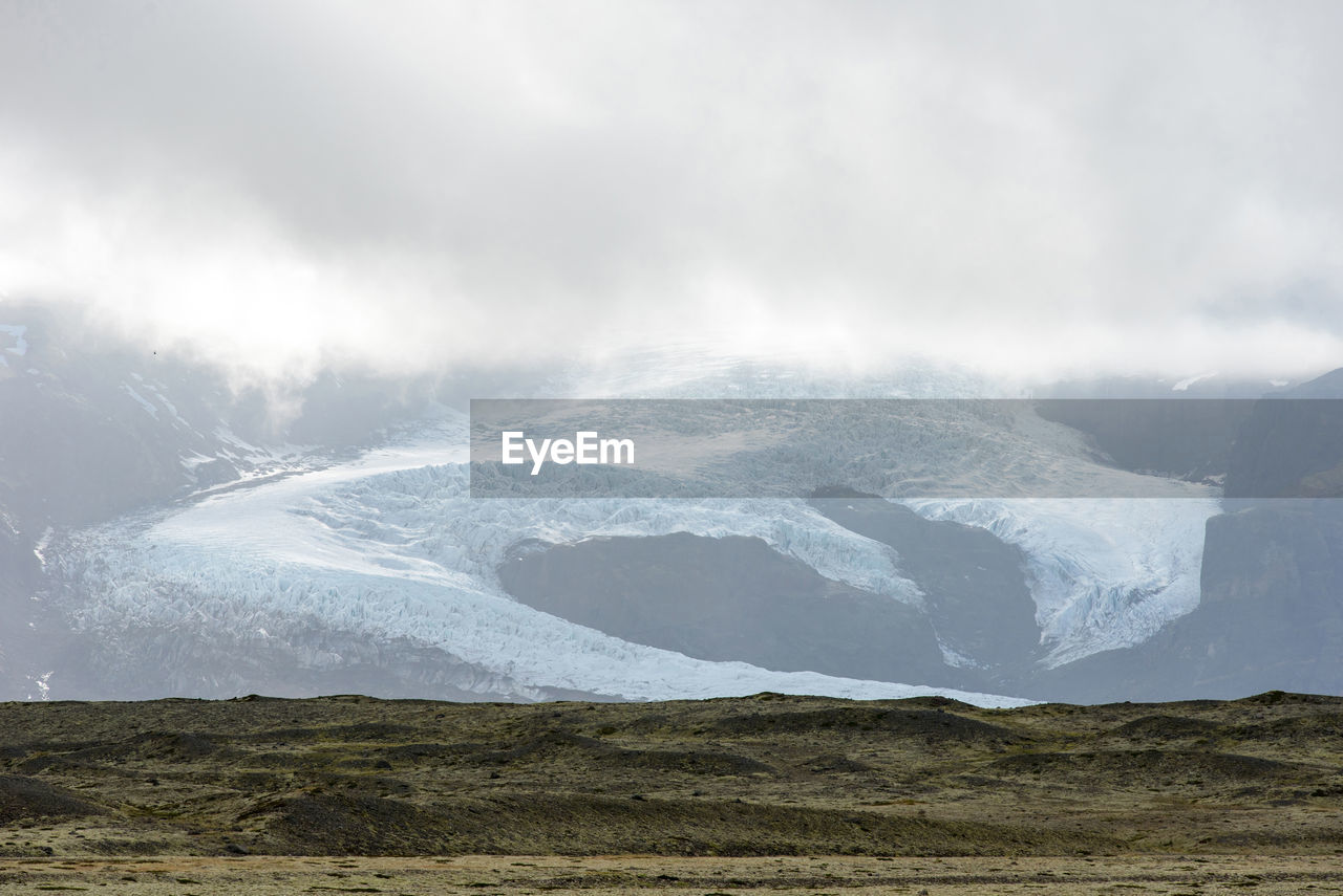 Melting glacial tongue of fjallsjokull glacier, iceland. global warming concept