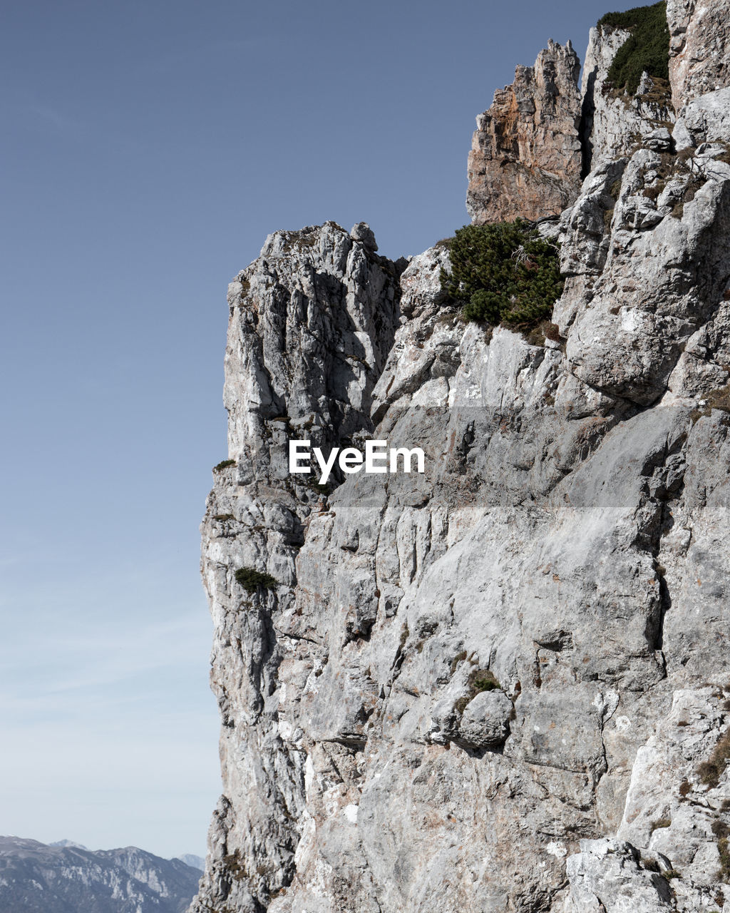 LOW ANGLE VIEW OF ROCK FORMATION AGAINST SKY