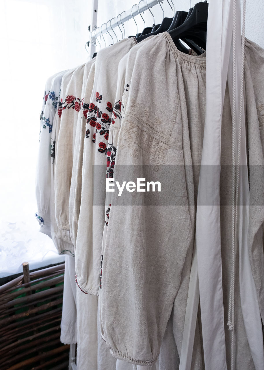 low angle view of clothes drying on white background