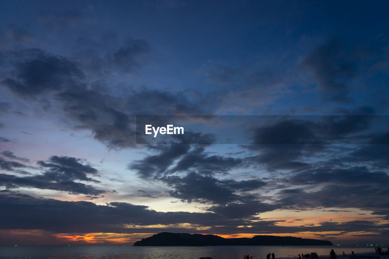 Low angle view of dramatic sky during sunset