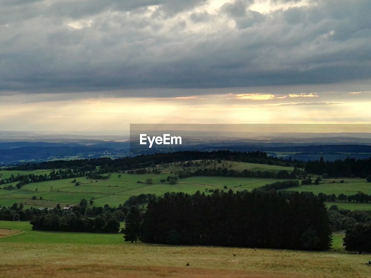 VIEW OF LANDSCAPE AGAINST CLOUDY SKY