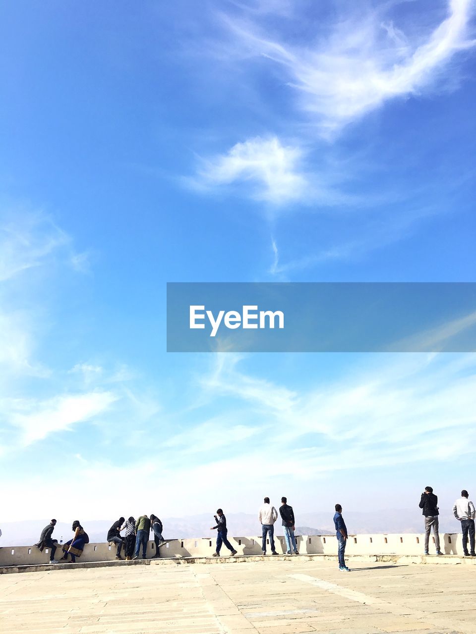 Group of people against clear sky