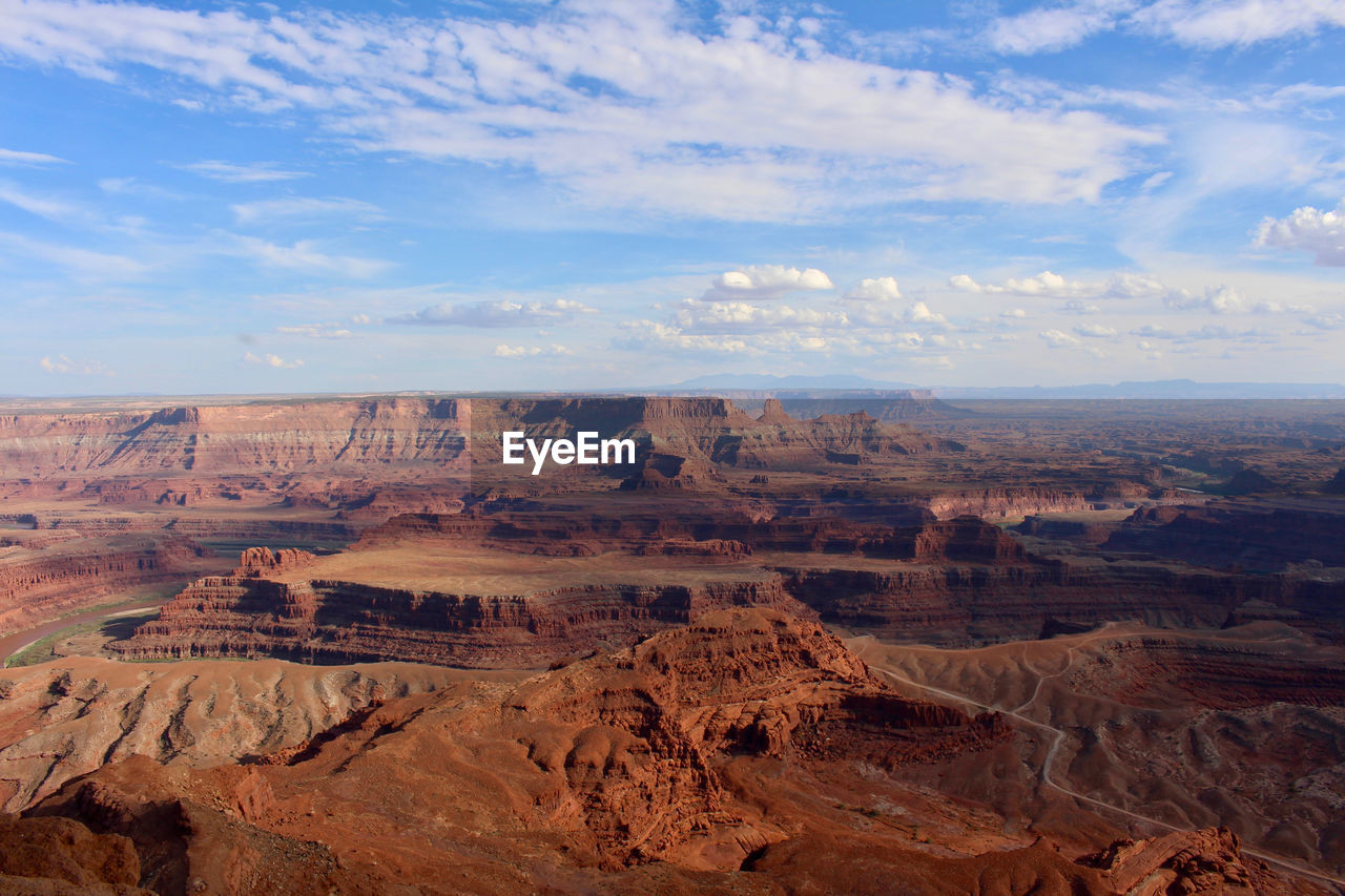 Aerial view of dramatic landscape against sky