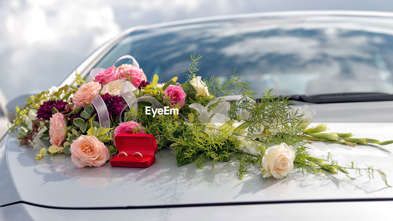 Close-up of rose bouquet on car