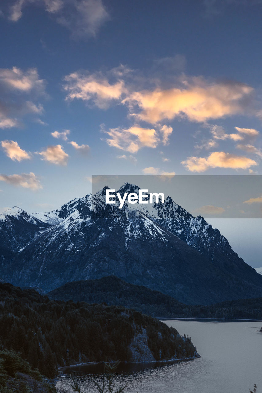 SCENIC VIEW OF SNOWCAPPED MOUNTAIN AGAINST SKY