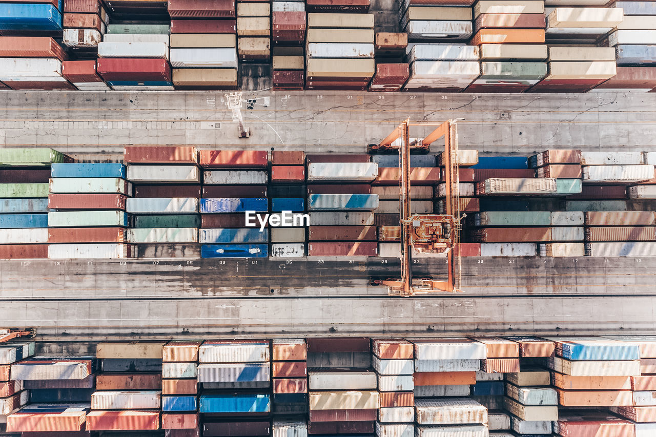 Aerial view of shipping container port terminal. colourful pattern of containers in harbor. maritime