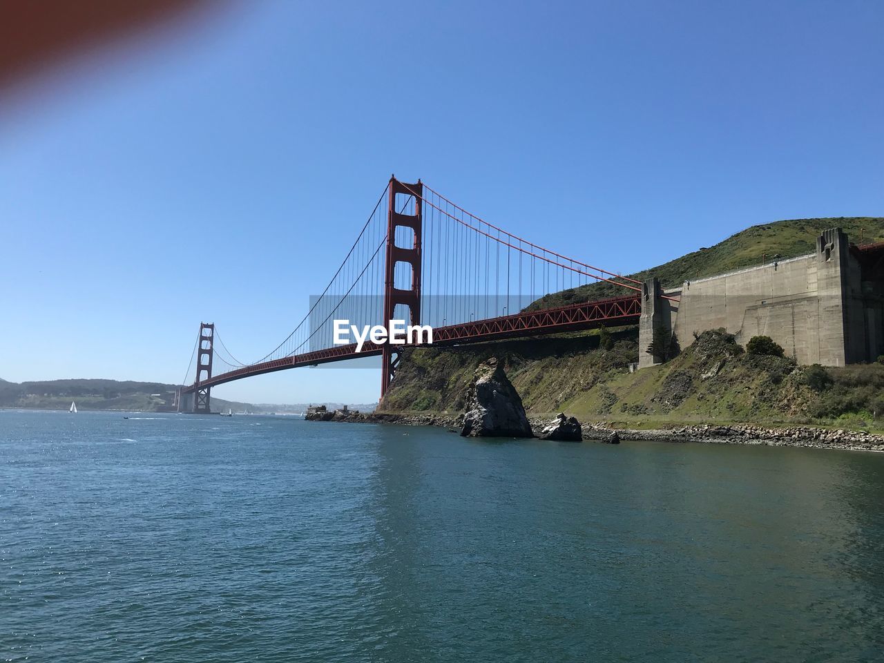 VIEW OF SUSPENSION BRIDGE AGAINST SKY