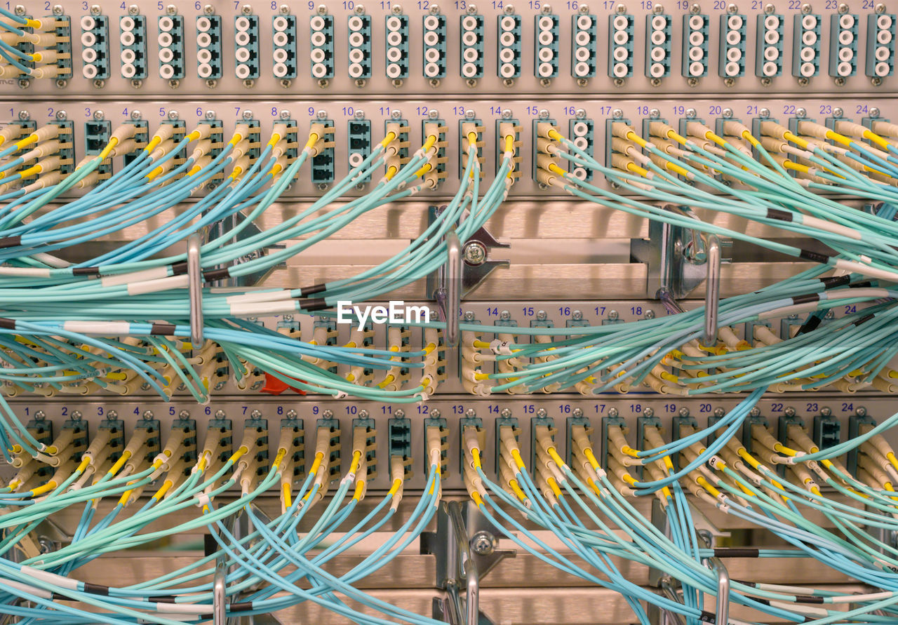 Network switch with fiber optic network cables in a data center