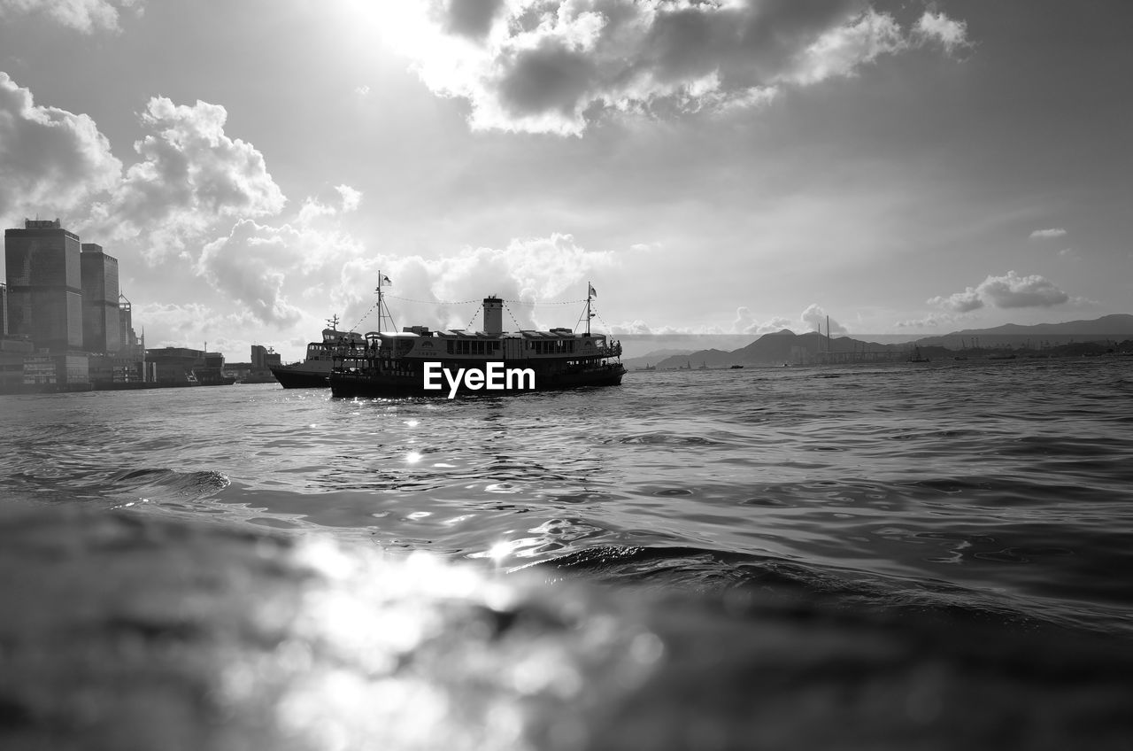 Ship in sea against sky