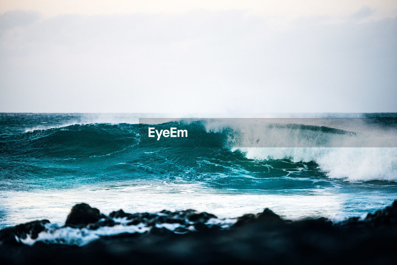 Scenic view of sea against clear sky