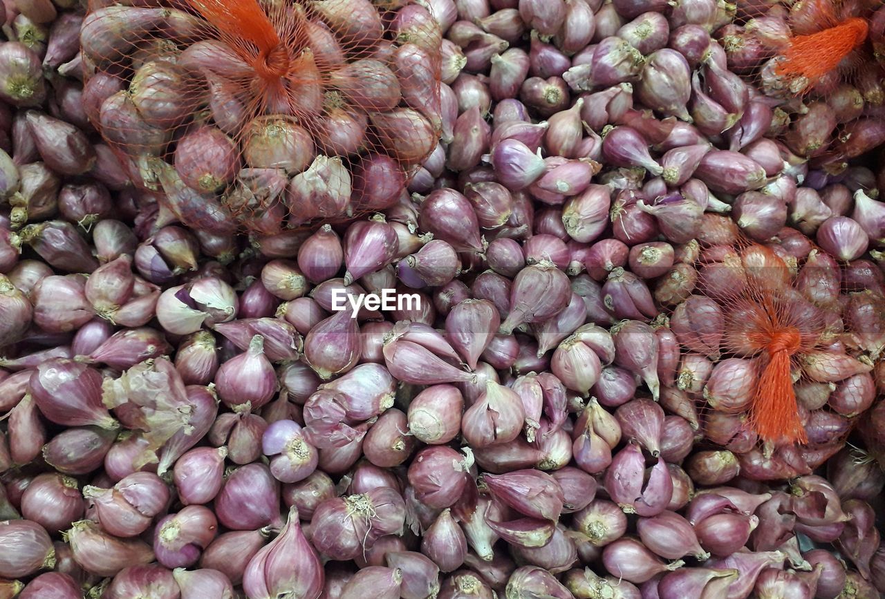 full frame shot of onions for sale