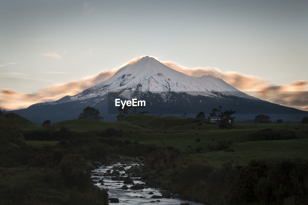 SCENIC VIEW OF MOUNTAINS AGAINST SKY DURING WINTER