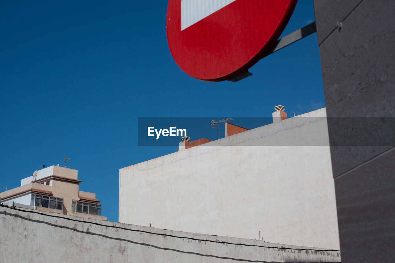 Geometric composition, stop sign, buildings