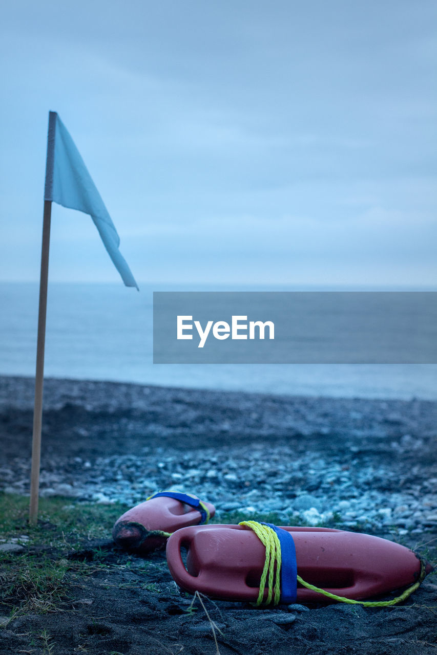 LOW SECTION OF PERSON ON BEACH