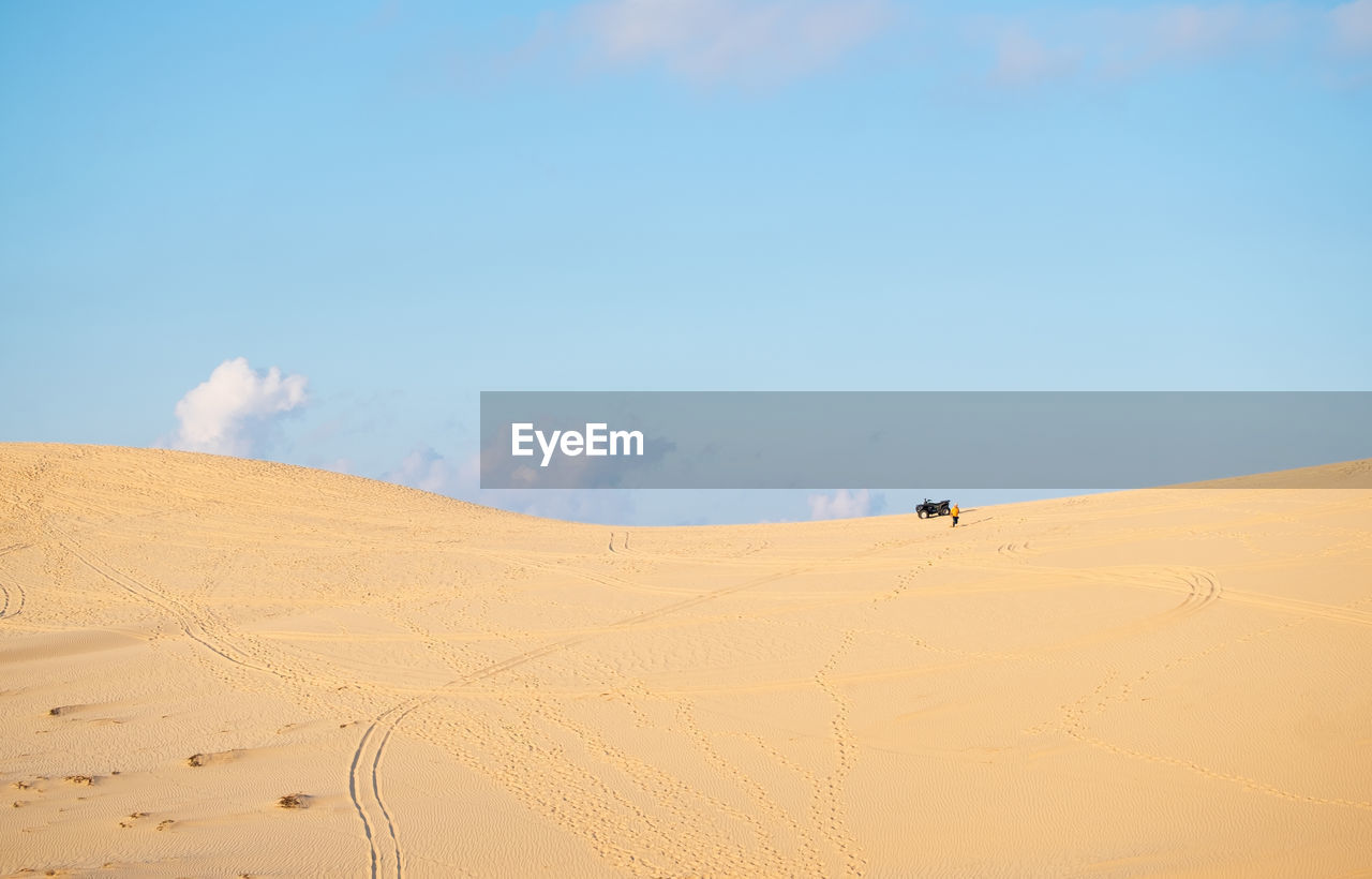 Scenic view of desert against sky