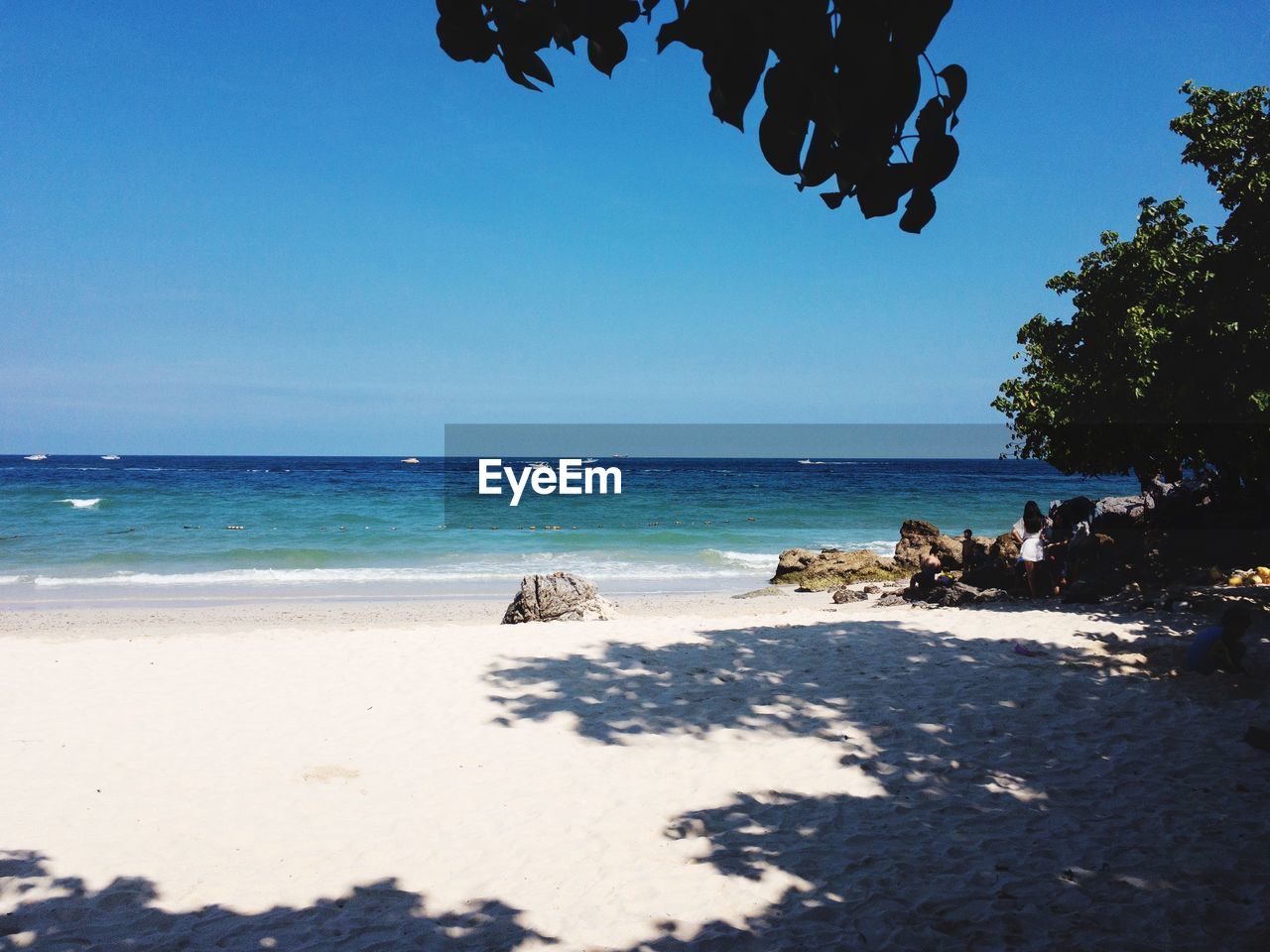 Scenic view of beach against clear sky