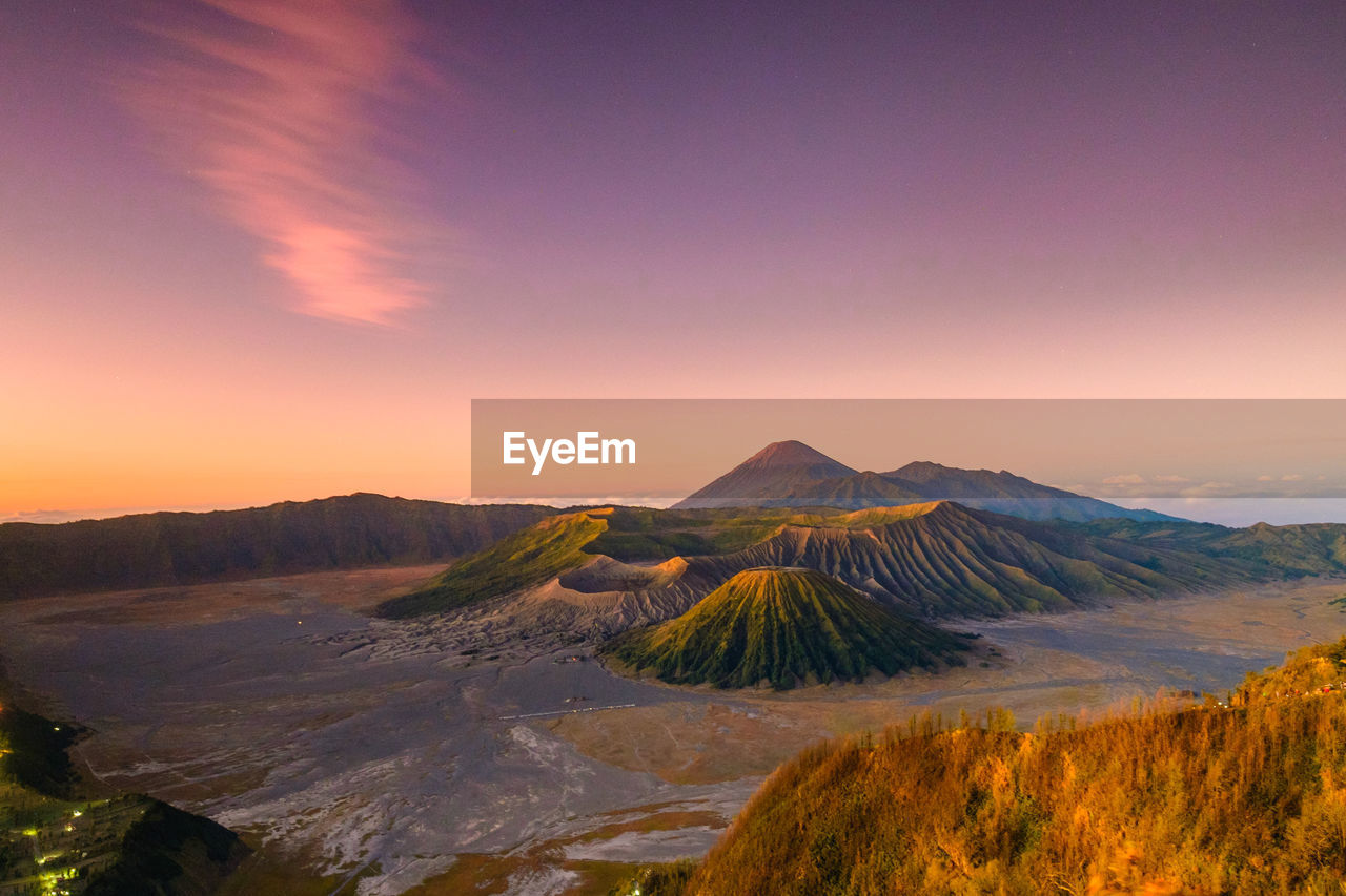 Aerial view of landscape against sky during sunset