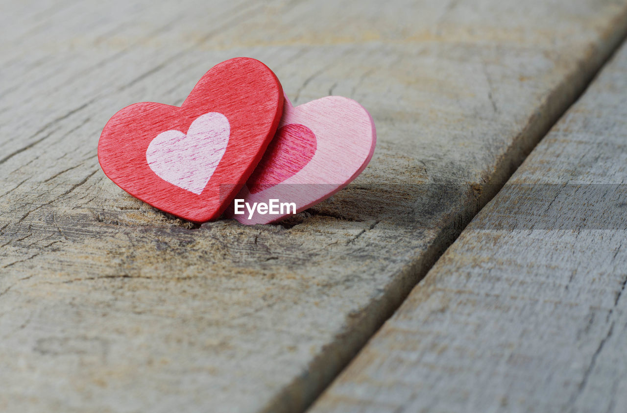 High angle view of heart shapes on wooden table