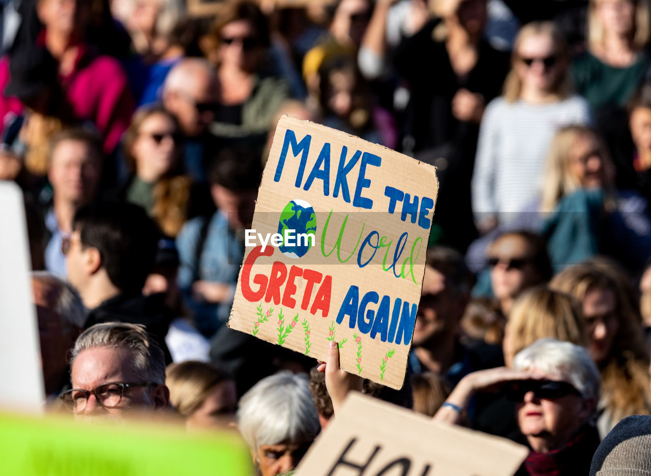 GROUP OF PEOPLE IN FRONT OF CROWD