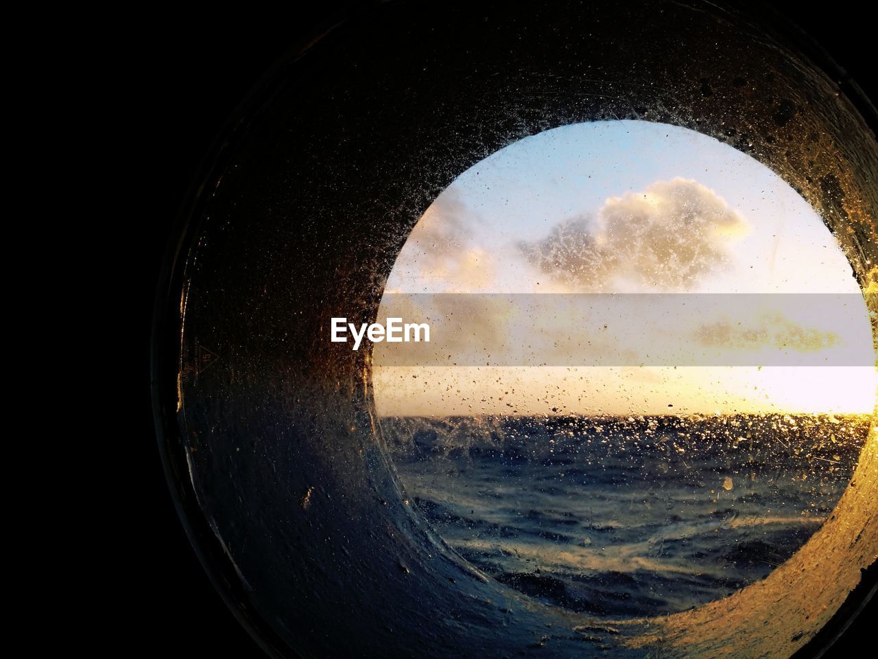 Close-up of water against clear sky during sunset