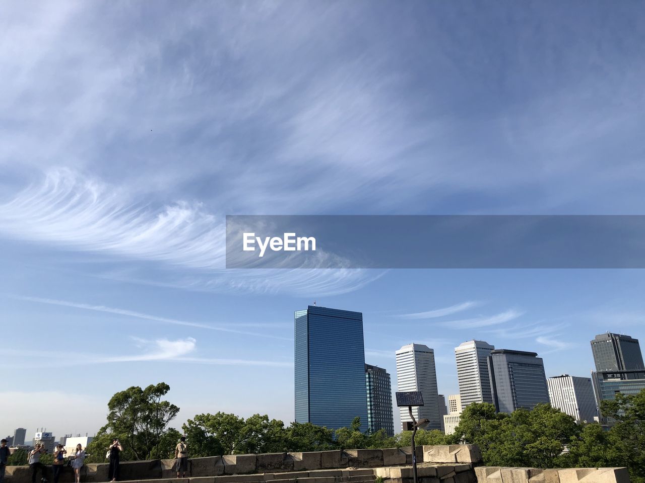 Modern buildings against sky in city