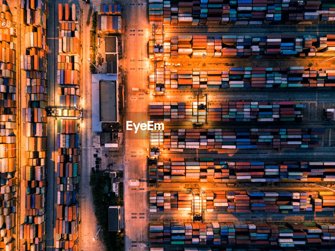 Aerial view of illuminated commercial dock at night