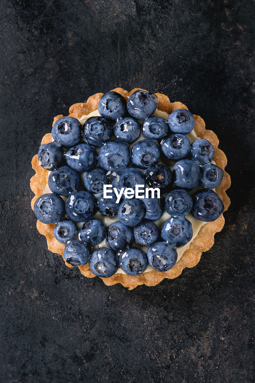 Blueberry tart on table