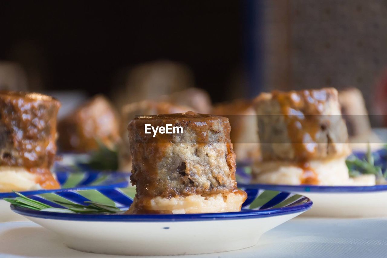 CLOSE-UP OF FOOD ON TABLE