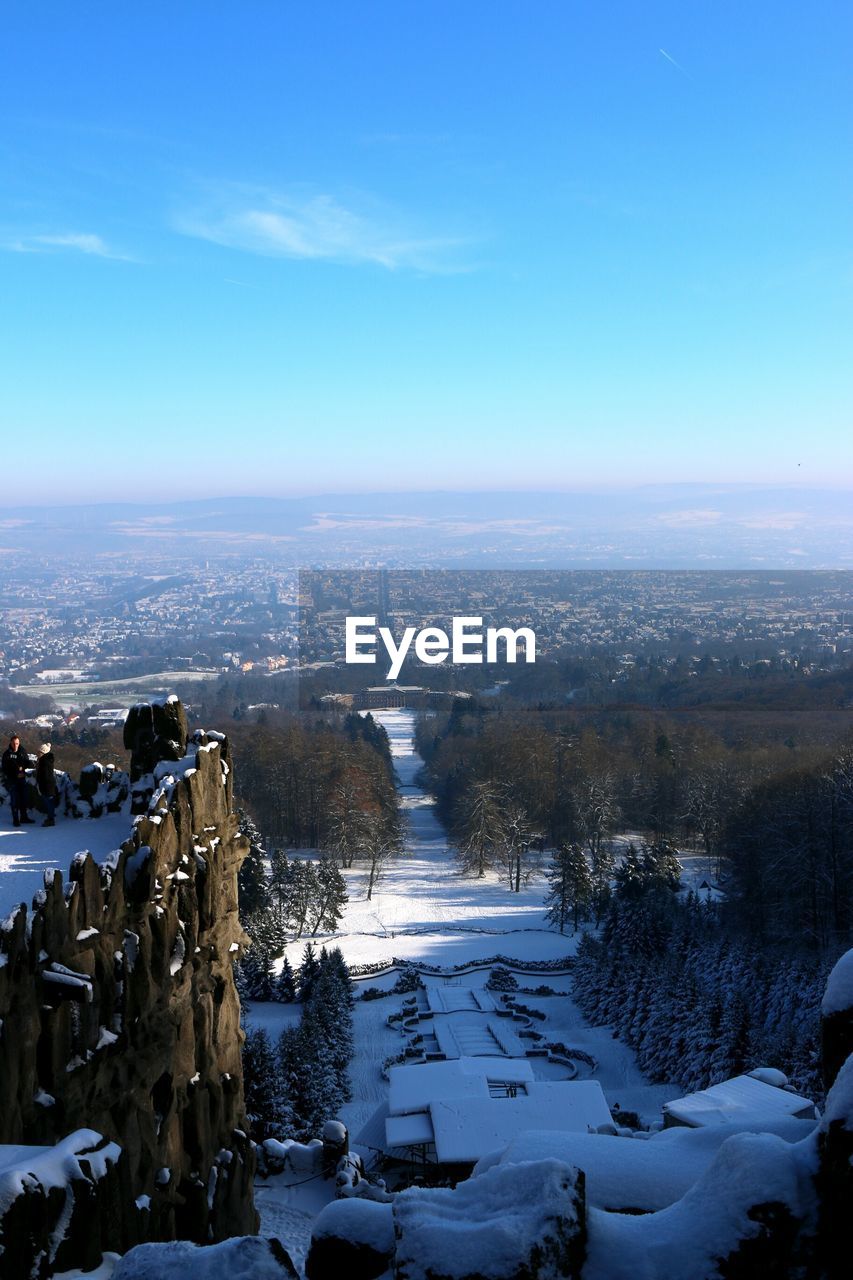 Aerial view of landscape against sky during winter