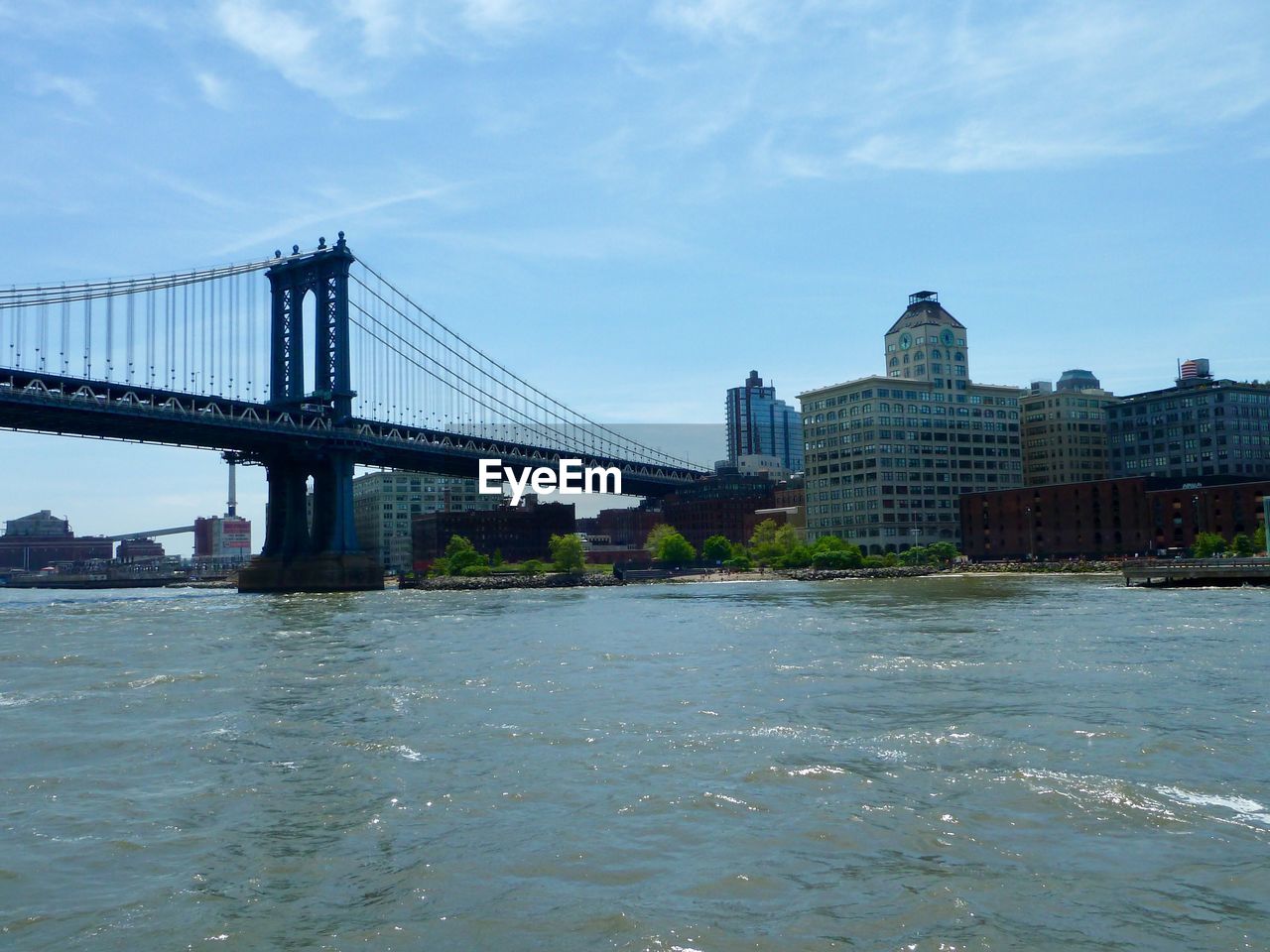 View of suspension bridge in city