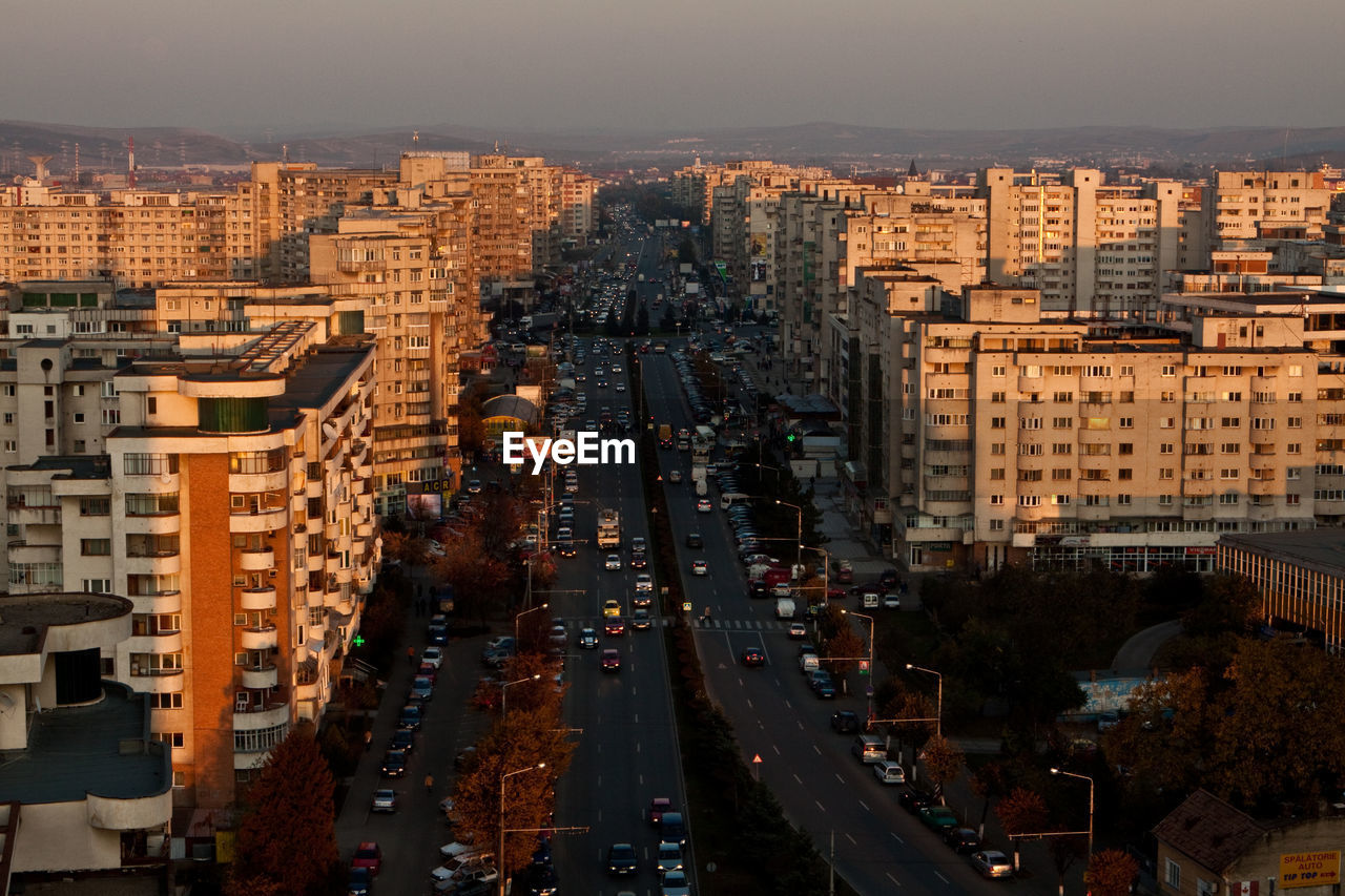 HIGH ANGLE VIEW OF CITY STREET AND BUILDINGS