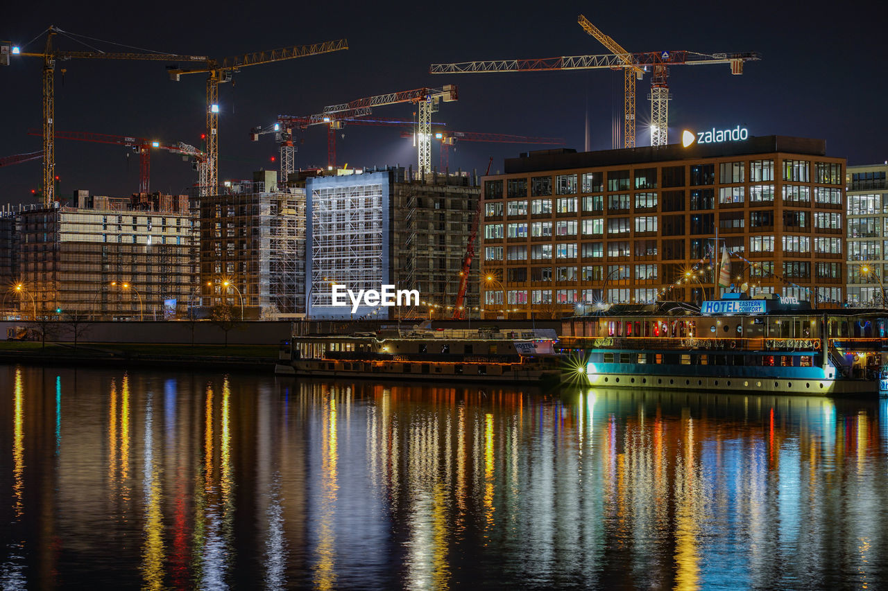 ILLUMINATED BUILDINGS AT NIGHT