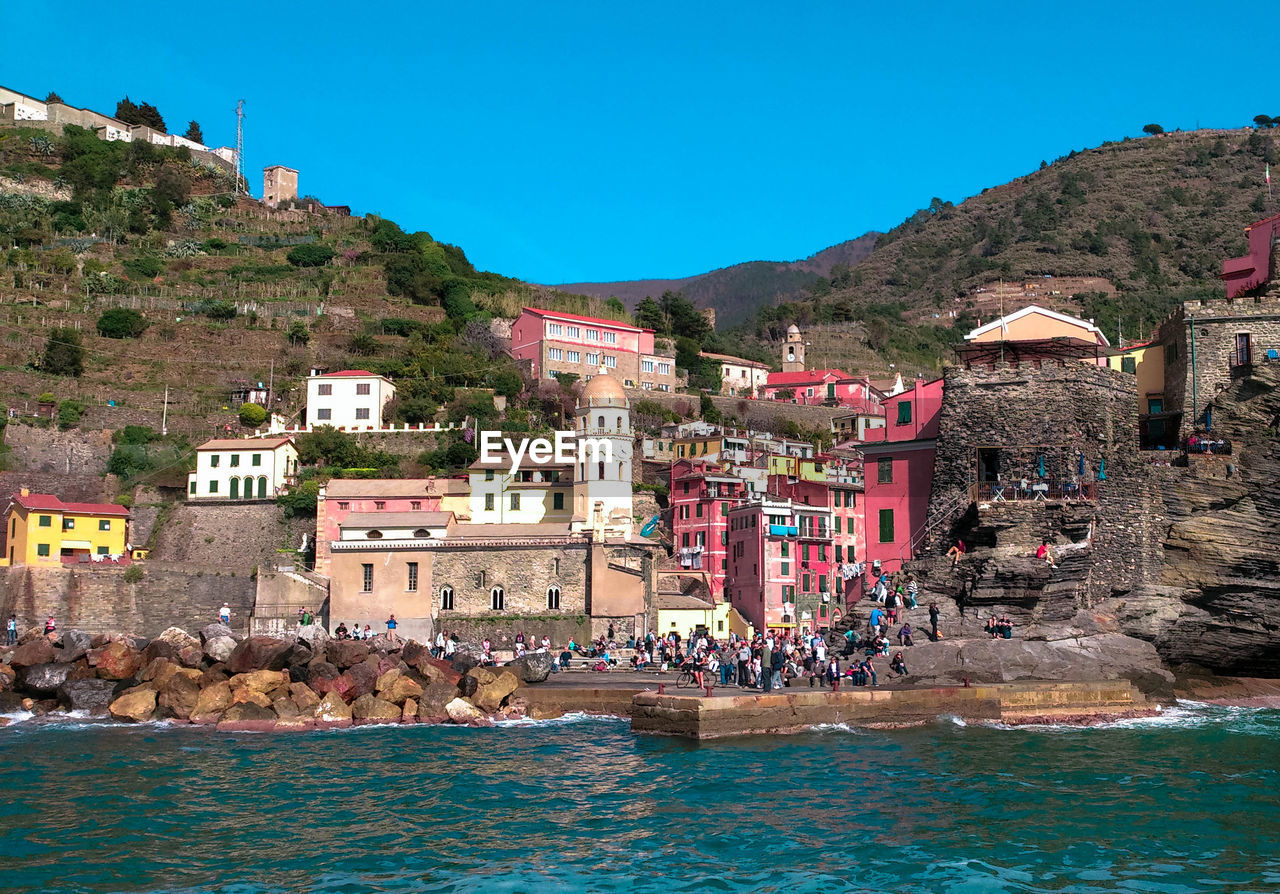 Scenic view of sea against clear blue sky