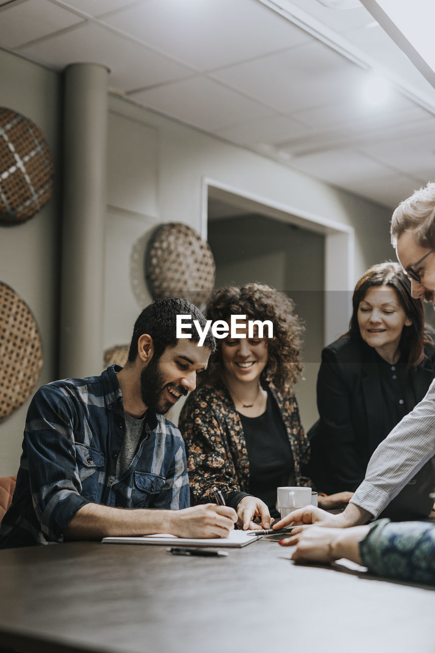 People talking during business meeting