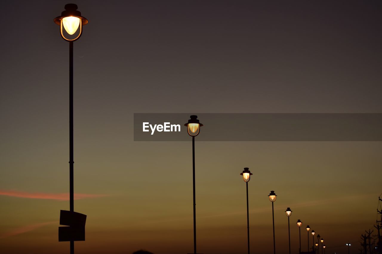 LOW ANGLE VIEW OF STREET LIGHT AGAINST SKY