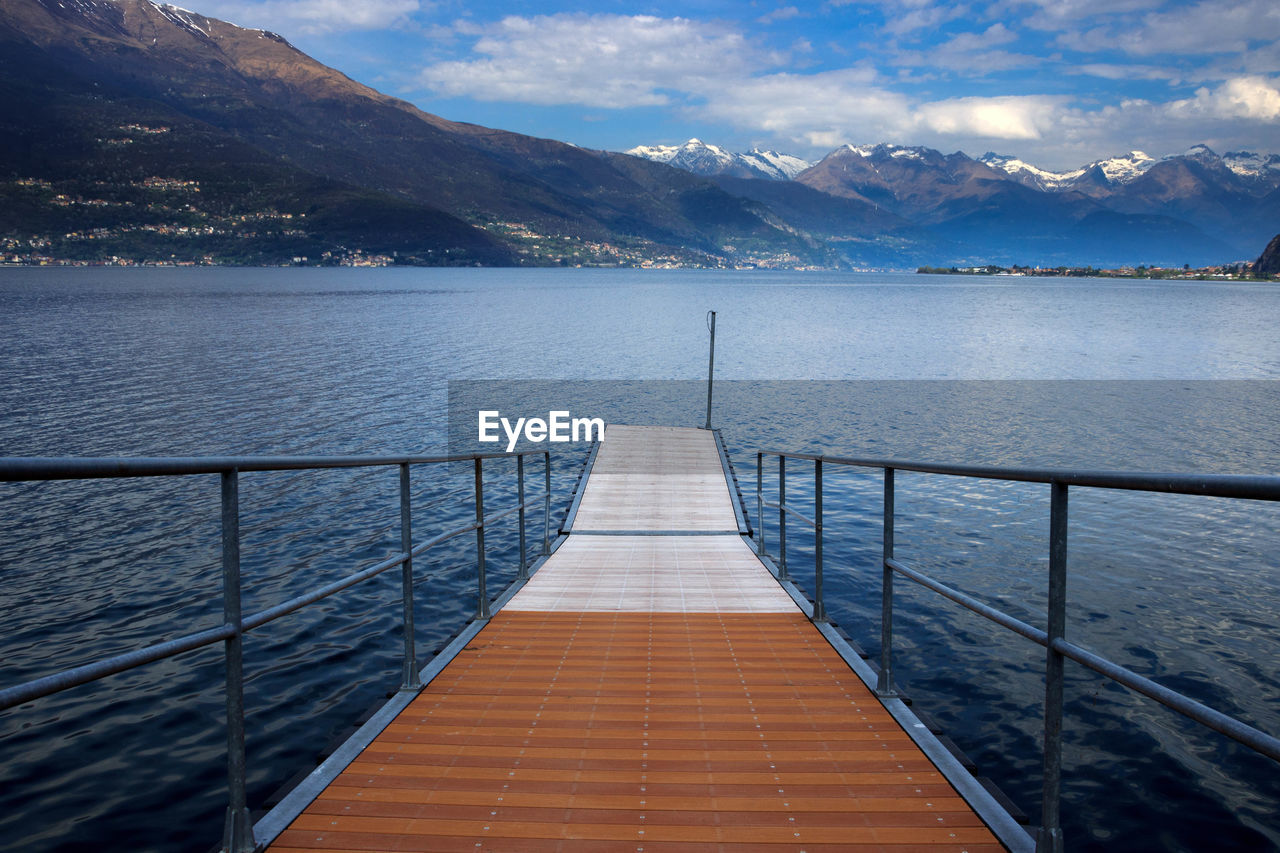 Scenic view of lake against sky during winter