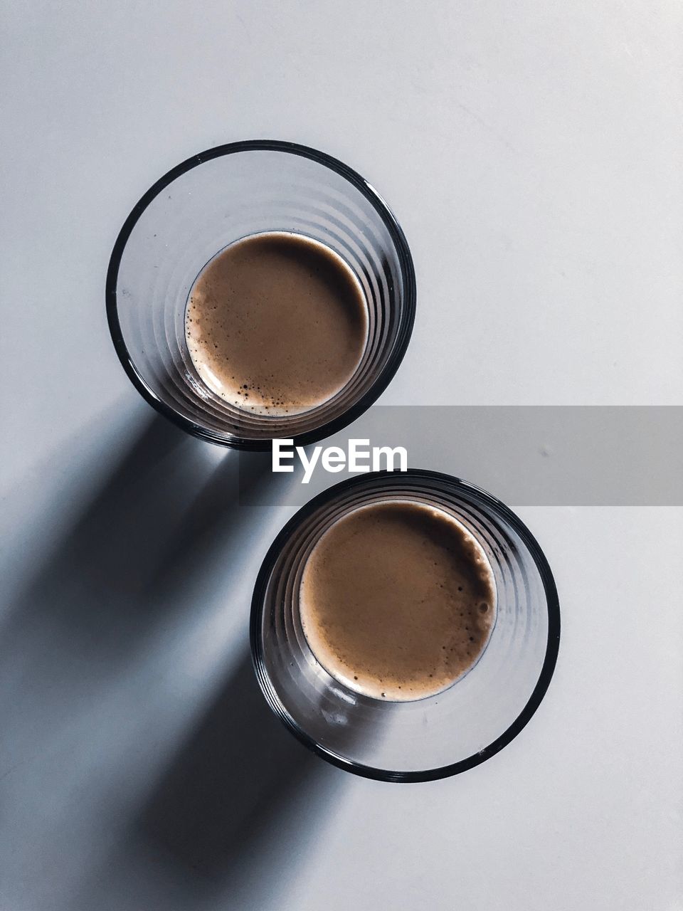 DIRECTLY ABOVE SHOT OF COFFEE ON TABLE